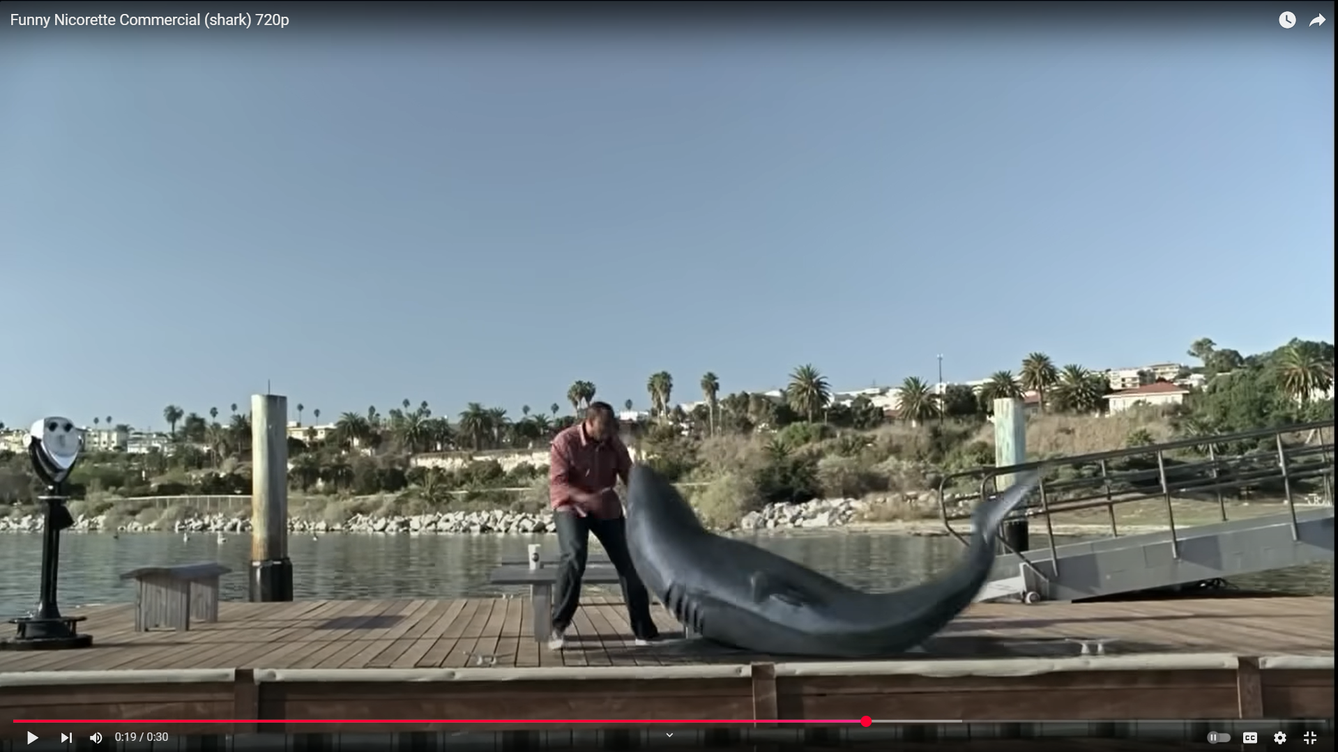 Shark attacking man, representing nicotine cravings - the most popular YouTube ad