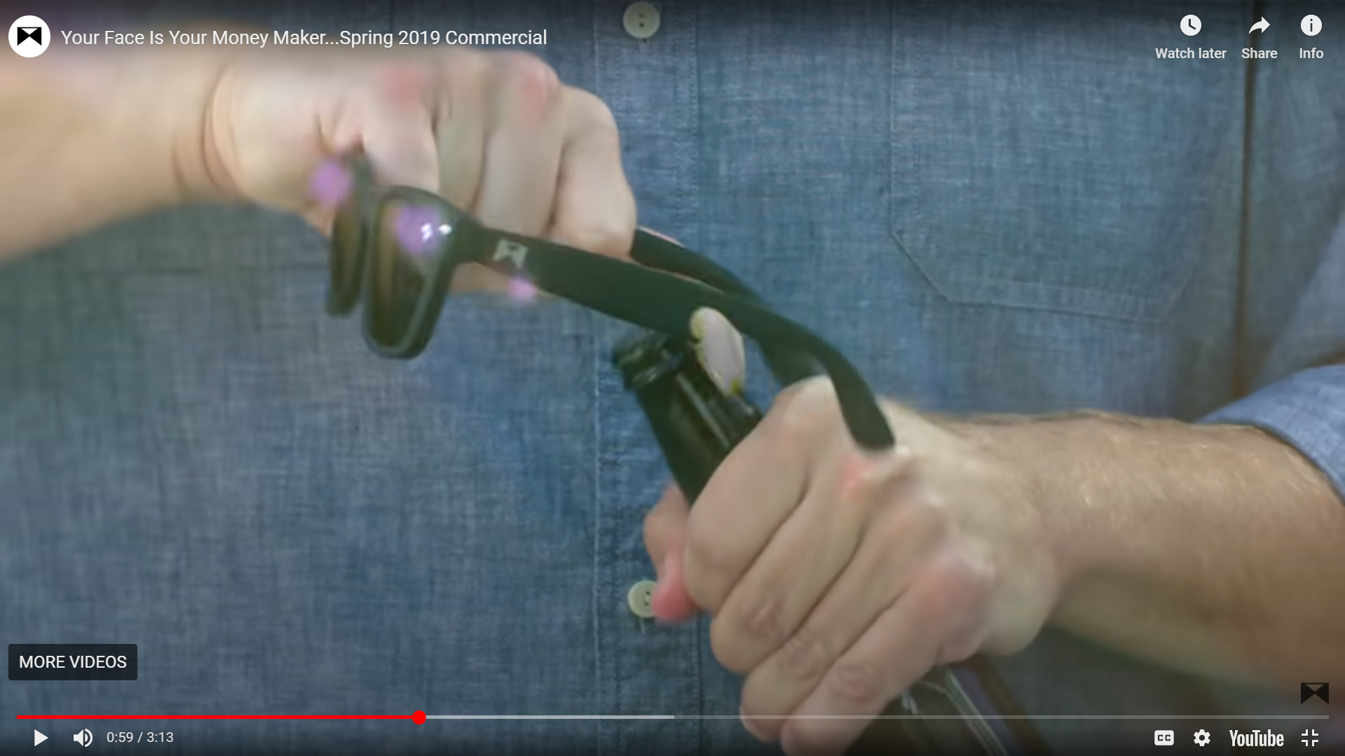 A person using William Painter glasses as a bottle opener - the most popular YouTube ad